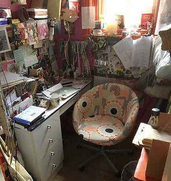 Photo of the author's writing space with a colourful swivel chair suitable for a big bottom!