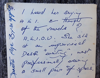 a fragment of the author's mum's writing describing the author as a three year old sitting down to 'write' at a n improvised desk.