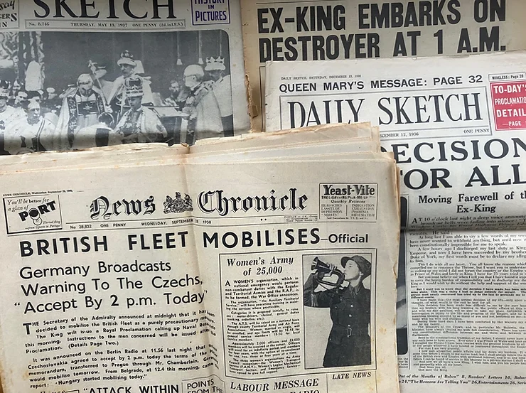 Newspapers from 1930s, mostly front pages about Edward 7th's abdication and the coronation  of George 6th in 1937 but a news Chronicle rom 1938 with the headline 'British Fleet Mobilises'