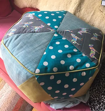 an hexagonal patchwork pouffe