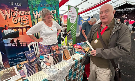 The Wonder Girls stall at Tolpuddle Festival 2024. with Southampton Mayor 24-25 Dave Sheilds
